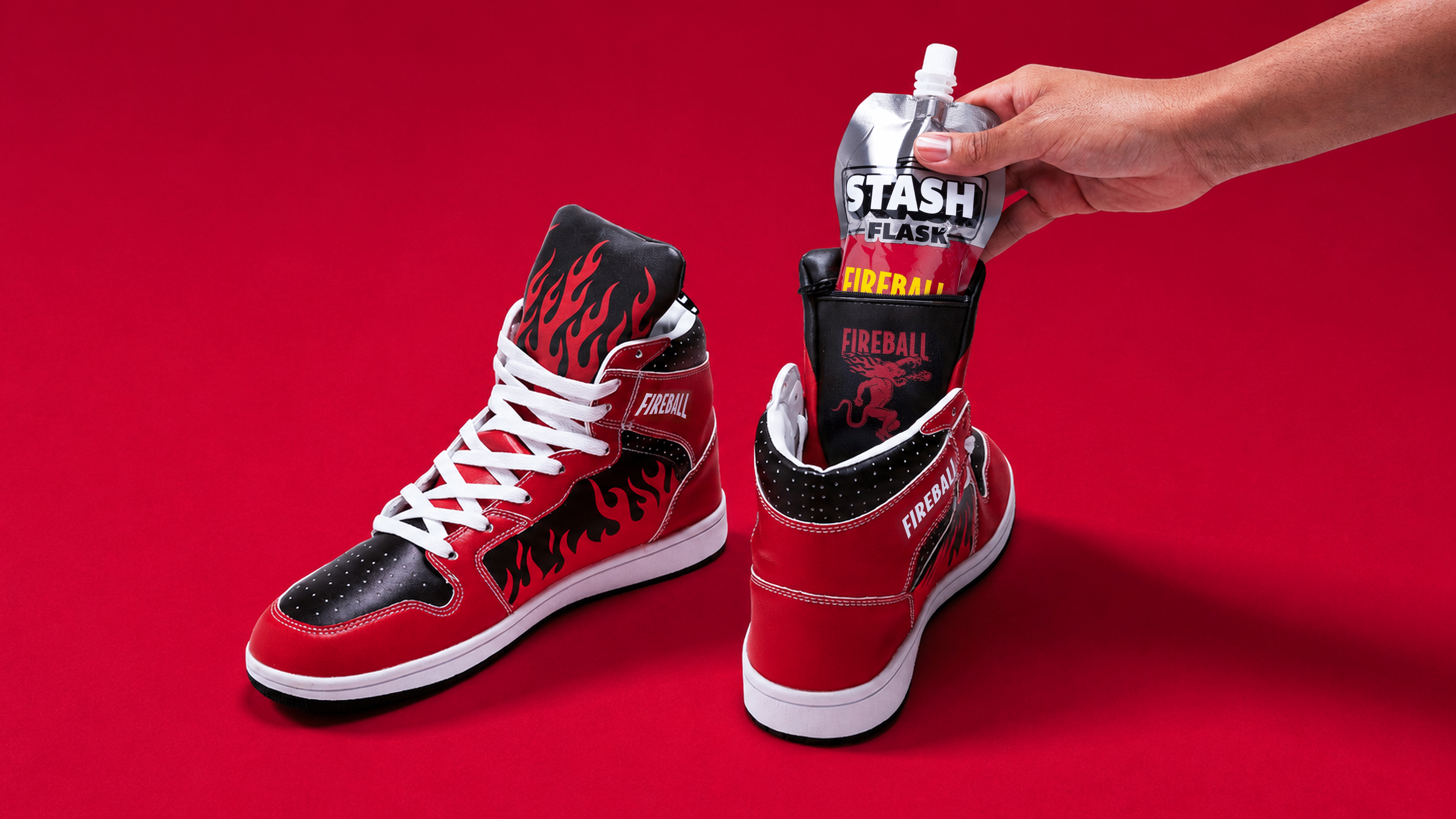 The Fireball Sneaks pair with the Stash Flask and dragon-lined tongue