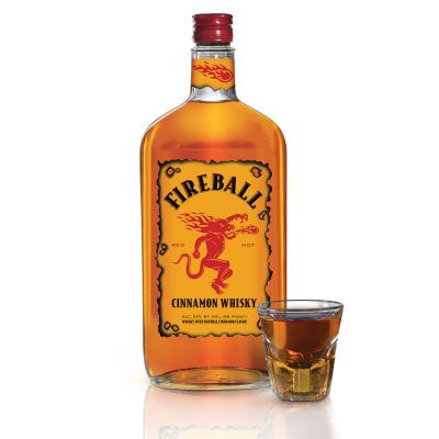 Download Fireball bottle with full shot glass on white background