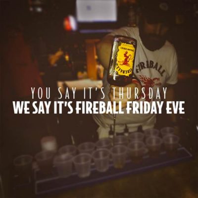 Download Bartender pouring Fireball shots with words You Say It's Thursday, We Say It's Fireball Friday Eve on top