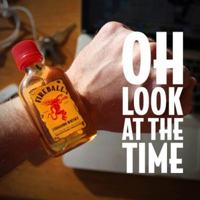 Download Mini Fireball bottle on person's wrist with words Oh Look At The Time written on top