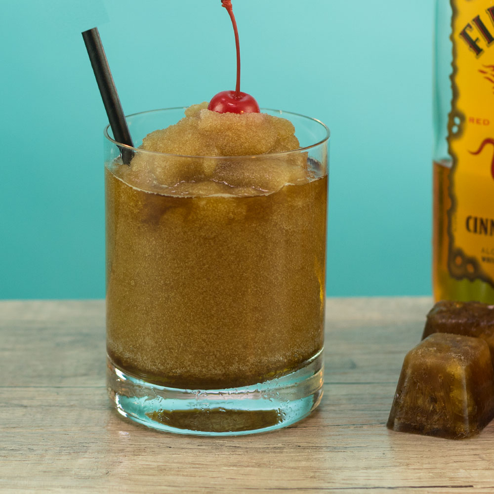 Closeup of a Fireball Cola Slushie in a cup